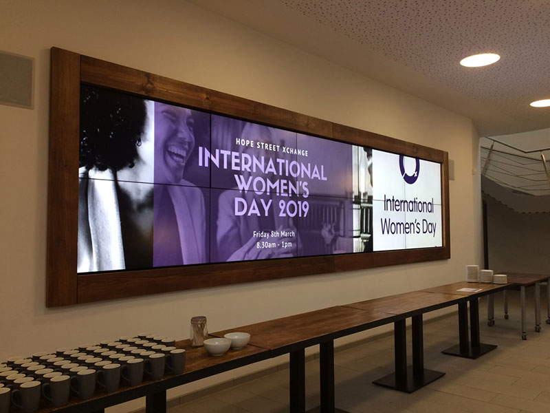 International Women's Day advertised in the Hope Street Xchange foyer.